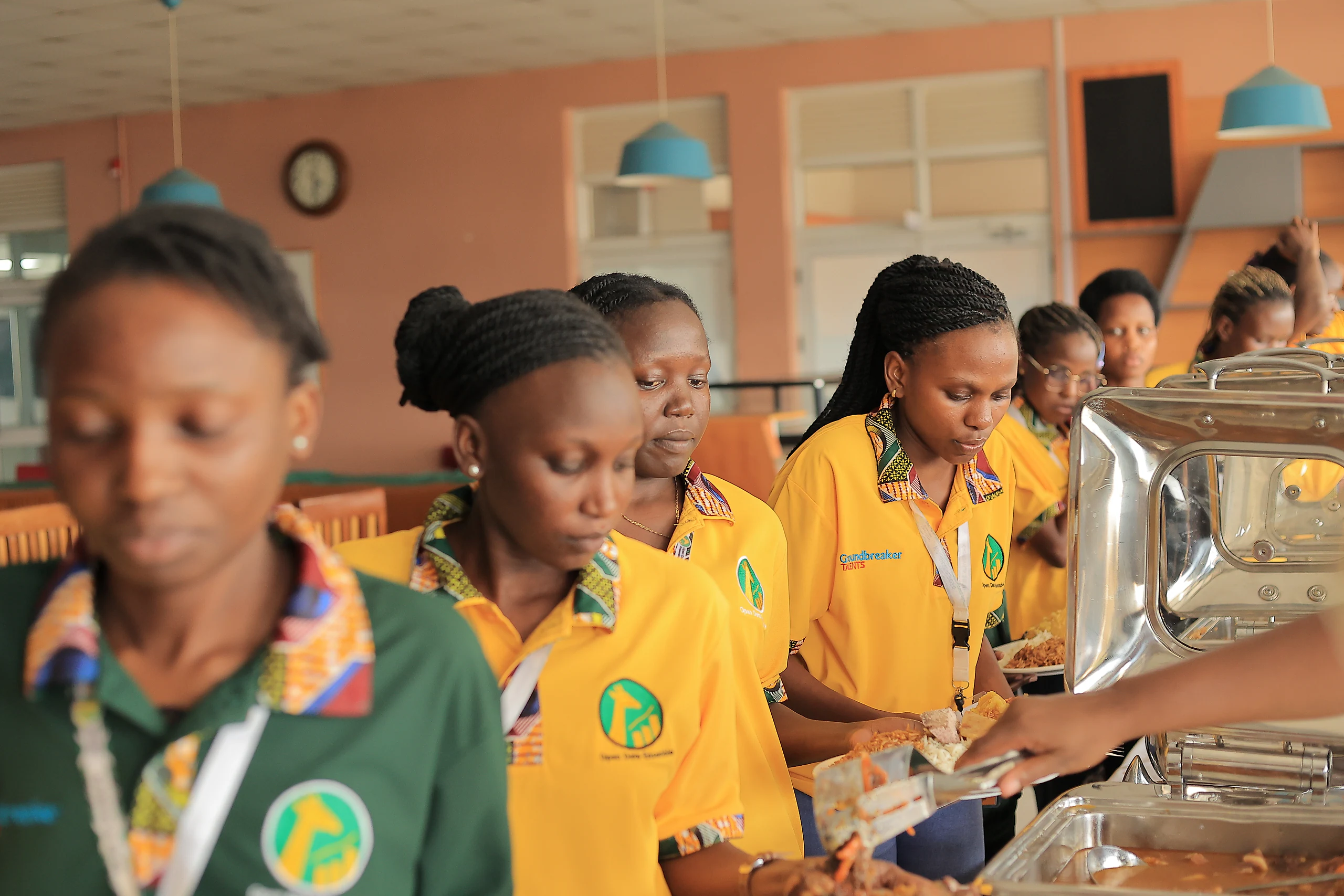 Participants serve themselves at the lunch buffet.